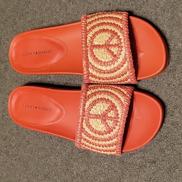 Lucky Brand Shoes - NWOT Lucky Brand slides in dark coral color...peace sign in a straw material